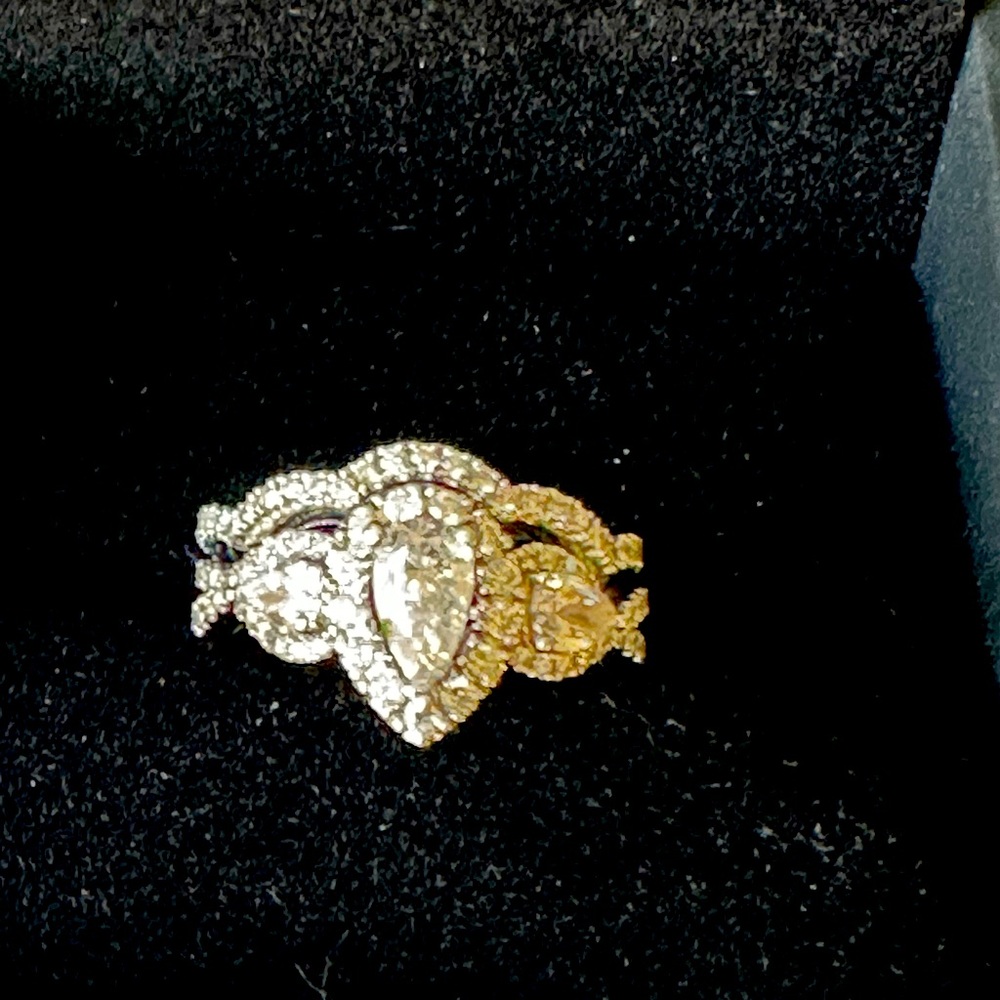 White gold Neil lane bridal set.  purchased brand new with maintenance records